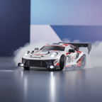 Voiture télécommandée grise motifs rouges et noirs Speed Power Drift 1:24, en train de déraper